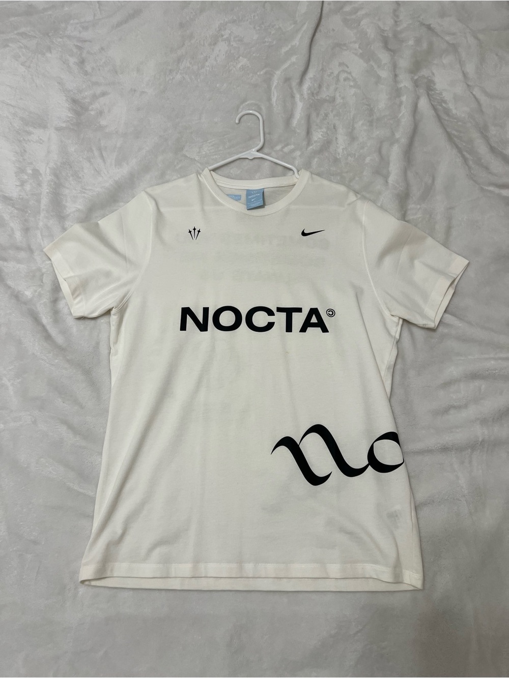 Nike NOCTA White Short Sleeve Tee with Black Logo